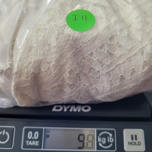 Elegant White Lace Sleeveless Dress - Picture 12 of 12